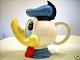 MMTPT116 ~ YOU'RE HIRED? YOU'RE WIRED? YOU'RE TIRED? WELL, NOW YOU'RE FIRED!-donald-duck-teapot.jpg